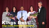 Elizabeth Dooley, CEO of Educational Employees Credit Union and Kings County Superintendent Tim Bowers honor the winners (left to right) Loretta Black, Lionel Garza, and Catherine Koelewyn.
